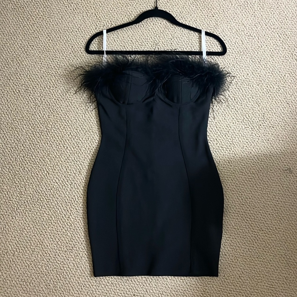 Little black strapless dress with feathered neckline